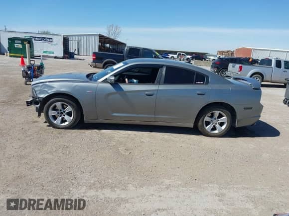 2014 Dodge Charger SE with VIN 2C3CDXBG1EH168709, listed as a IAAI auction lot 41872541 with 137,877 mi miles and . Bid and sale history available at DreamBid. Image 15.