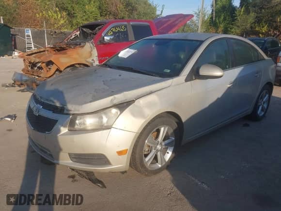 2012 Chevrolet Cruze 2LT with VIN 1G1PG5SC1C7282376, listed as a IAAI auction lot 43322731 with 242,578 mi miles and . Bid and sale history available at DreamBid. Image 2.