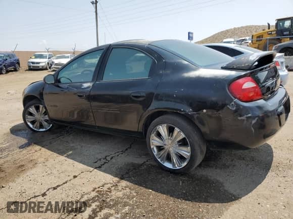 2003 Dodge Neon SXT z VIN 1B3ES56C03D180674, wystawiony jako Copart lot #64026784 z przebiegiem 127 740 mil mil oraz Szkoda całkowita • Salvage title. Historia ofert i sprzedaży dostępna na DreamBid. Obrazek 2.