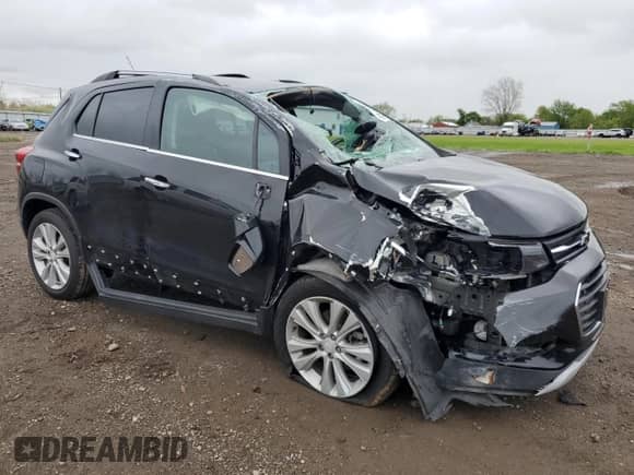 2020 Chevrolet Trax Premier with VIN 3GNCJRSB1LL224602, listed as a Copart auction lot 55843155 with 50,396 mi miles and Salvage title. Bid and sale history available at DreamBid. Image 4.