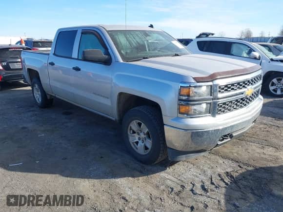 2014 Chevrolet Silverado 1500 LT z VIN 3GCUKREC9EG141445, wystawiony jako IAAI lot #41357325 z przebiegiem 158 604 mil mil oraz . Historia ofert i sprzedaży dostępna na DreamBid. Obrazek 1.