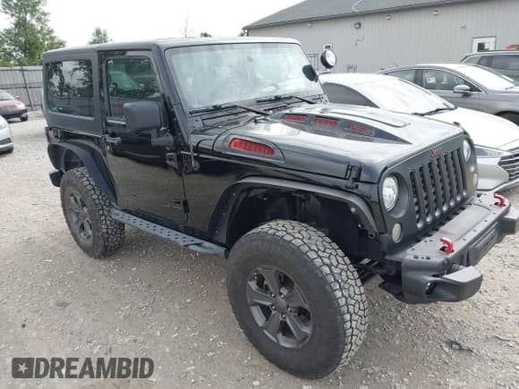 2018 Jeep Wrangler Rubicon Recon with VIN 1C4BJWCG6JL814834, listed as a IAAI auction lot 42327297 with 59,623 mi miles and . Bid and sale history available at DreamBid. Image 1.