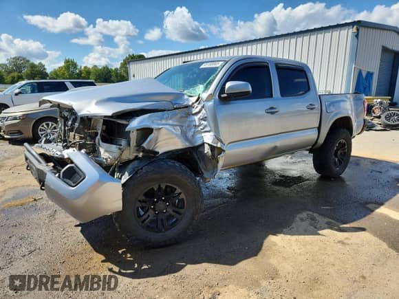 2020 Toyota Tacoma SR5 z VIN 3TMCZ5AN1LM311240, wystawiony jako Copart lot #85188965 z przebiegiem 149 027 mil mil oraz Szkoda całkowita • Salvage title. Historia ofert i sprzedaży dostępna na DreamBid. Obrazek 1.