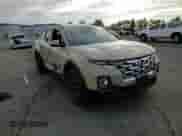 2023 Hyundai Santa Cruz SEL z VIN 5NTJCDAE5PH073098, wystawiony jako Copart lot #81286125 z przebiegiem 57 432 mil mil oraz Szkoda całkowita • Salvage title. Historia ofert i sprzedaży dostępna na DreamBid. Obrazek 13.