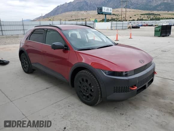 2025 Hyundai Ioniq 5 with VIN 7YAKPDDC1SY011215, listed as a Copart auction lot 61011705 with 31 mi miles and Salvage title. Bid and sale history available at DreamBid. Image 4.