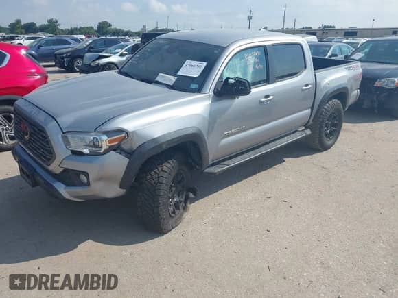 2021 Toyota Tacoma SR with VIN 5TFCZ5ANXMX268304, listed as a IAAI auction lot 43066752 with 66,578 mi miles and . Bid and sale history available at DreamBid. Image 17.