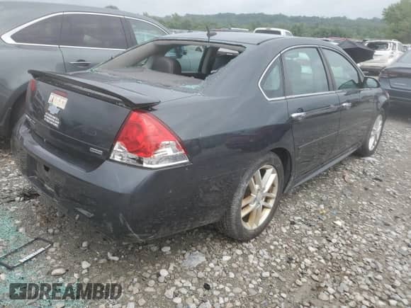 2014 Chevrolet Impala LTZ z VIN 2G1WC5E31E1100601, wystawiony jako Copart lot #59885615 z przebiegiem 156 474 mil mil oraz Szkoda całkowita • Salvage title. Historia ofert i sprzedaży dostępna na DreamBid. Obrazek 3.