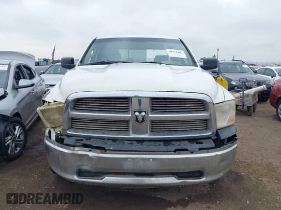 2009 Dodge 1500 SLT with VIN 1D3HB18T69S812221, listed as a IAAI auction lot 40715494 with 306,416 mi miles and . Bid and sale history available at DreamBid. Image 12.