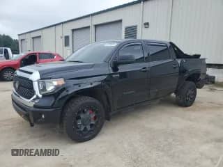 2020 Toyota Tundra SR5 with VIN 5TFDY5F16LX882083, listed as a Copart auction lot 66256685 with 97,699 mi miles and Salvage title. Bid and sale history available at DreamBid. Image 1.