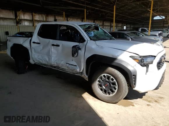 2024 Toyota Tacoma SR5 with VIN 3TYLB5JN1RT001588, listed as a Copart auction lot 72055575 with 21,312 mi miles and Salvage title. Bid and sale history available at DreamBid. Image 4.