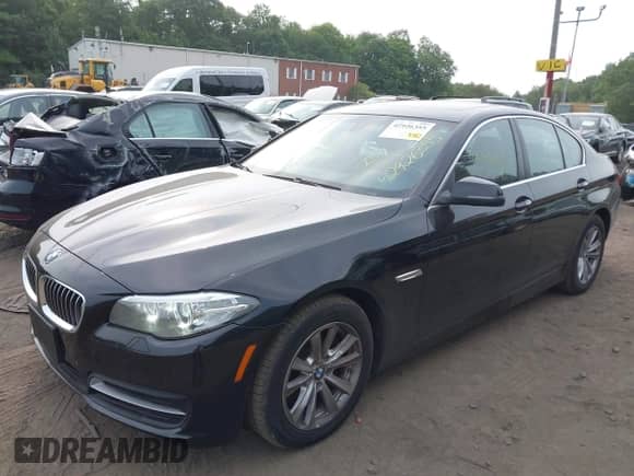 2014 BMW 5 Series 528i xDrive with VIN WBA5A7C50ED615857, listed as a IAAI auction lot 42926355 with 131,175 mi miles and . Bid and sale history available at DreamBid. Image 2.