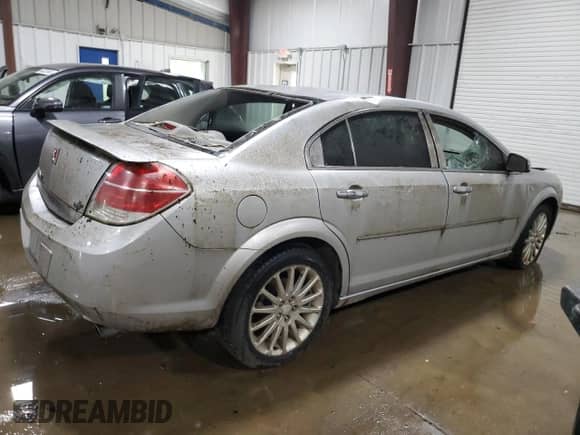 2009 Saturn Aura XR z VIN 1G8ZX57759F117290, wystawiony jako Copart lot #55570065 z przebiegiem Nie podano mil oraz Szkoda całkowita • Salvage title. Historia ofert i sprzedaży dostępna na DreamBid. Obrazek 3.