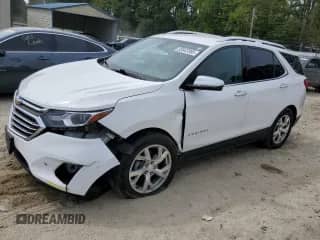 2021 Chevrolet Equinox Premier with VIN 3GNAXNEV5MS151066, listed as a Copart auction lot 83942395 with 49,606 mi miles and Salvage title. Bid and sale history available at DreamBid. Image 1.