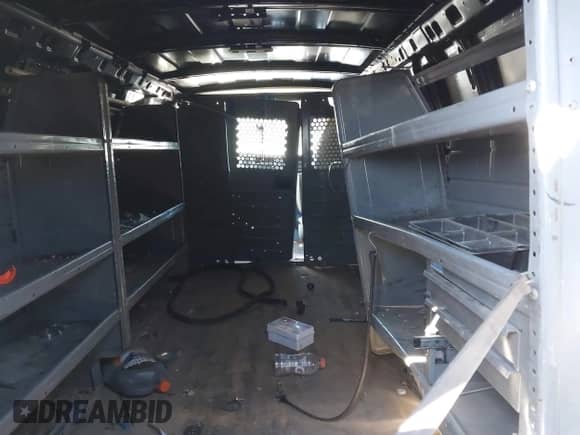 2017 Chevrolet Express Cargo with VIN 1GCWGBFF9H1112640, listed as a IAAI auction lot 41401549 with 157,773 mi miles and . Bid and sale history available at DreamBid. Image 8.