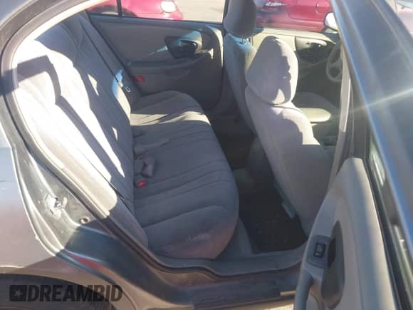 2005 Chevrolet Malibu Classic z VIN 1G1ND52F25M171916, wystawiony jako IAAI lot #42192421 z przebiegiem 165 936 mil mil oraz . Historia ofert i sprzedaży dostępna na DreamBid. Obrazek 8.