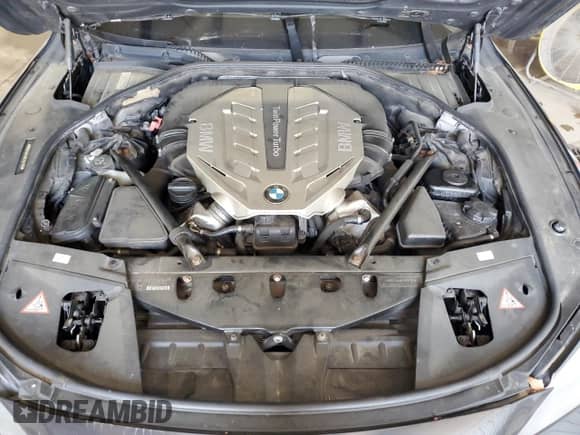 2011 BMW 7 Series 750i xDrive with VIN WBAKC6C51BC394293, listed as a Copart auction lot 55119865 with Not provided miles and Salvage title. Bid and sale history available at DreamBid. Image 11.