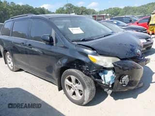 2014 Toyota Sienna LE AAS with VIN 5TDKK3DC0ES525623, listed as a IAAI auction lot 42823834 with 211,670 mi miles and . Bid and sale history available at DreamBid. Image 1.