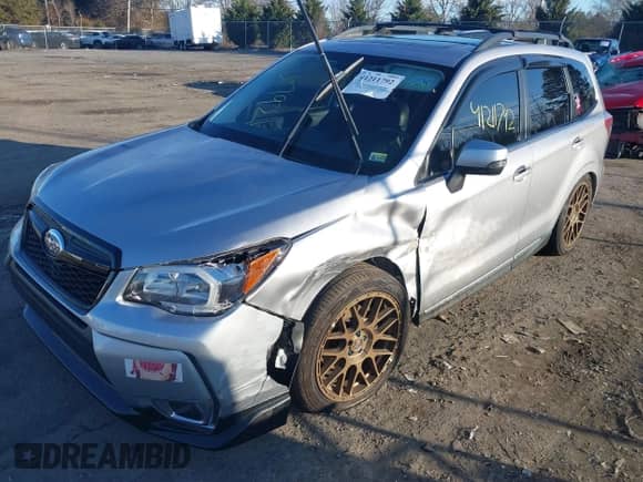 2016 Subaru Forester XT Touring z VIN JF2SJGXCXGH482715, wystawiony jako IAAI lot #41211792 z przebiegiem 95 610 mil mil oraz . Historia ofert i sprzedaży dostępna na DreamBid. Obrazek 2.