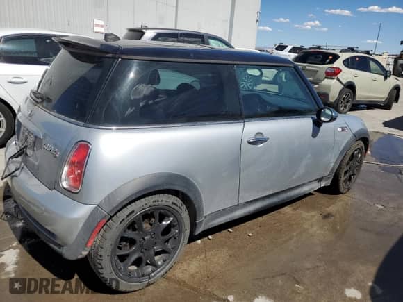 2006 MINI Hardtop S with VIN WMWRE33586TJ37385, listed as a Copart auction lot 67606184 with 78,671 mi miles and Salvage title. Bid and sale history available at DreamBid. Image 3.