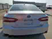 2019 Toyota Camry Hybrid LE с VIN 4T1B21HK2KU512025, выставлен на аукционе Copart как лот 80734415 с пробегом 106 463 миль миль и Списание • Salvage title. История ставок и продаж доступна на DreamBid. Изображение 6.