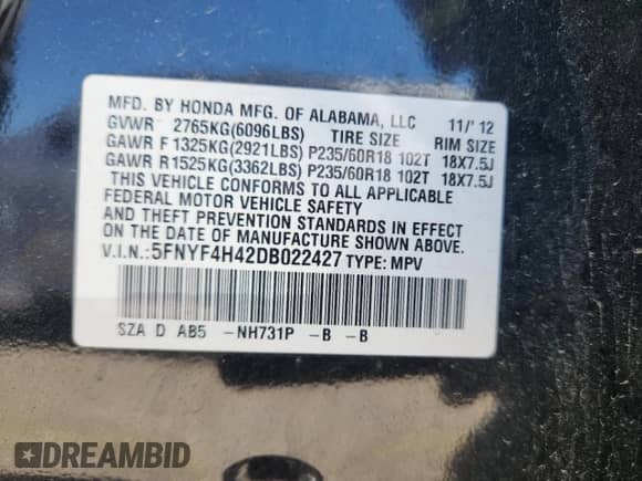 2013 Honda Pilot EX z VIN 5FNYF4H42DB022427, wystawiony jako Copart lot #63735065 z przebiegiem 102 454 mil mil oraz Szkoda całkowita • Salvage title. Historia ofert i sprzedaży dostępna na DreamBid. Obrazek 13.