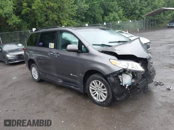 2015 Toyota Sienna XLE with VIN 5TDYK3DC0FS641593, listed as a IAAI auction lot 42501522 with 97,633 mi miles and . Bid and sale history available at DreamBid. Image 1.