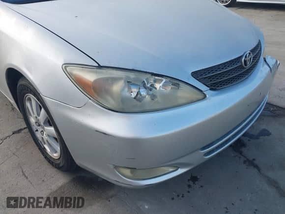 2003 Toyota Camry LE z VIN 4T1BF30K33U559514, wystawiony jako IAAI lot #43518376 z przebiegiem 203 514 mil mil oraz . Historia ofert i sprzedaży dostępna na DreamBid. Obrazek 15.