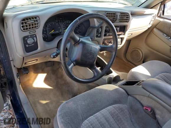 2000 Chevrolet Blazer LS с VIN 1GNCS18W0YK207971, выставлен на аукционе Copart как лот 77089384 с пробегом 135 250 миль миль и Списание • Salvage title. История ставок и продаж доступна на DreamBid. Изображение 8.