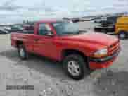 1999 Dodge Dakota z VIN 1B7GG26XXXS211490, wystawiony jako Copart lot #53779955 z przebiegiem 146 012 mil mil oraz Szkoda całkowita • Salvage title. Historia ofert i sprzedaży dostępna na DreamBid. Obrazek 4.