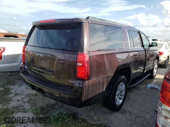 2020 Chevrolet Suburban LS с VIN 1GNSKGKC0LR210771, выставлен на аукционе Copart как лот 73931854 с пробегом 12 674 миль миль и Списание • Salvage title. История ставок и продаж доступна на DreamBid. Изображение 3.