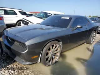 2012 Dodge Challenger R/T with VIN 2C3CDYBT0CH275489, listed as a Copart auction lot 67852624 with 100,406 mi miles and Non repairable. Bid and sale history available at DreamBid. Image 1.