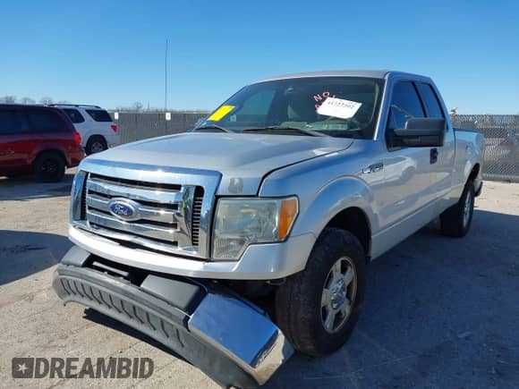 2010 Ford F-150 XL with VIN 1FTEX1C87AKE74719, listed as a IAAI auction lot 41727302 with 169,567 mi miles and . Bid and sale history available at DreamBid. Image 2.