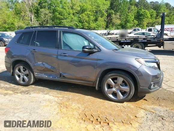 2021 Honda Passport Touring with VIN 5FNYF7H97MB011307, listed as a Copart auction lot 52310415 with 72,118 mi miles and Salvage title. Bid and sale history available at DreamBid. Image 4.