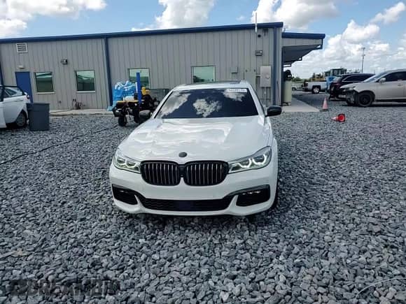 2016 BMW 7 Series 750i with VIN WBA7F0C51GGM20434, listed as a Copart auction lot 62339175 with 83,059 mi miles and Salvage title. Bid and sale history available at DreamBid. Image 13.