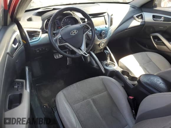 2013 Hyundai Veloster w/Gray Int z VIN KMHTC6AD7DU087124, wystawiony jako Copart lot #71488025 z przebiegiem 222 932 mil mil oraz Szkoda całkowita • Salvage title. Historia ofert i sprzedaży dostępna na DreamBid. Obrazek 8.