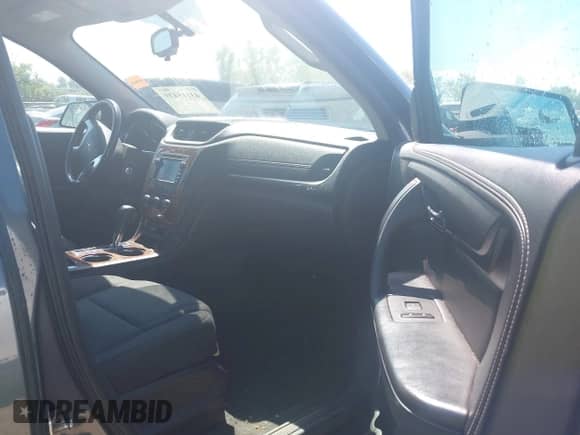 2013 Chevrolet Traverse LT z VIN 1GNKRGKD4DJ243857, wystawiony jako IAAI lot #43115439 z przebiegiem 198 745 mil mil oraz . Historia ofert i sprzedaży dostępna na DreamBid. Obrazek 5.