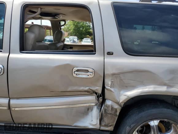 2003 Chevrolet Suburban LT z VIN 1GNEC16Z13J221251, wystawiony jako Copart lot #64169045 z przebiegiem 234 241 mil mil oraz Szkoda całkowita • Salvage title. Historia ofert i sprzedaży dostępna na DreamBid. Obrazek 11.
