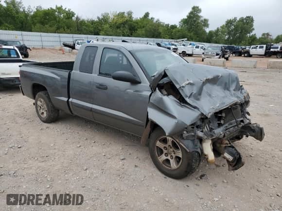 2006 Dodge Dakota SLT с VIN 1D7HE42K86S708932, выставлен на аукционе Copart как лот 66938765 с пробегом 243 244 миль миль и Списание • Salvage title. История ставок и продаж доступна на DreamBid. Изображение 4.