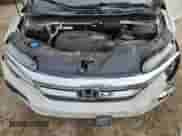 2019 Honda Pilot Touring 8-Passenger z VIN 5FNYF5H91KB018111, wystawiony jako Copart lot #71864465 z przebiegiem 96 937 mil mil oraz Szkoda całkowita • Salvage title. Historia ofert i sprzedaży dostępna na DreamBid. Obrazek 12.