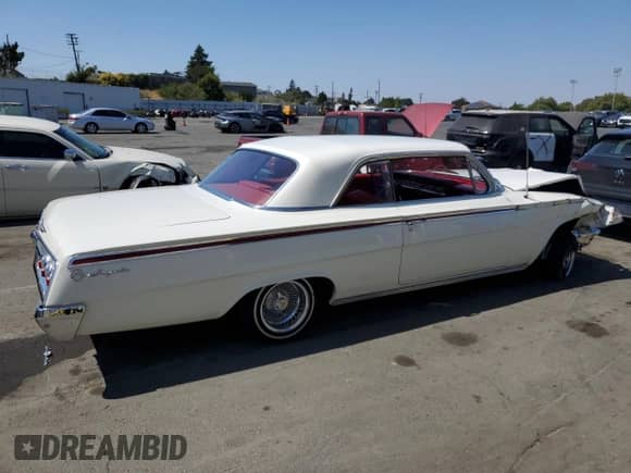 1962 Chevrolet Impala с VIN 21847L162268, выставлен на аукционе Copart как лот 64505575 с пробегом 65 672 миль миль и Списание • Salvage title. История ставок и продаж доступна на DreamBid. Изображение 3.