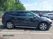 2011 Chevrolet Traverse 2LT z VIN 1GNKVJED0BJ294628, wystawiony jako IAAI lot #42741069 z przebiegiem 220 712 mil mil oraz . Historia ofert i sprzedaży dostępna na DreamBid. Obrazek 13.