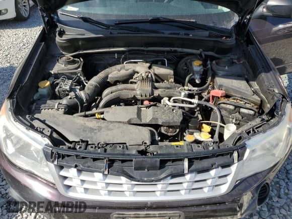 2013 Subaru Forester X z VIN JF2SHABC2DH410712, wystawiony jako Copart lot #84947895 z przebiegiem 104 099 mil mil oraz Czysty tytuł • Clean title. Historia ofert i sprzedaży dostępna na DreamBid. Obrazek 12.