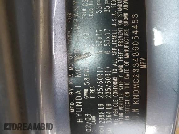 2008 Hyundai Entourage GLS z VIN KNDMC233486054453, wystawiony jako Copart lot #64286305 z przebiegiem 159 649 mil mil oraz Szkoda całkowita • Salvage title. Historia ofert i sprzedaży dostępna na DreamBid. Obrazek 14.