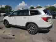 2021 Honda Pilot Touring 8-Passenger z VIN 5FNYF5H96MB011738, wystawiony jako Copart lot #68089255 z przebiegiem 126 655 mil mil oraz Szkoda całkowita • Salvage title. Historia ofert i sprzedaży dostępna na DreamBid. Obrazek 2.