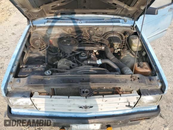 1986 Chevrolet S-10 EL with VIN 1GCBS14E4G2153624, listed as a Copart auction lot 68786004 with 282,699 mi miles and Salvage title. Bid and sale history available at DreamBid. Image 12.
