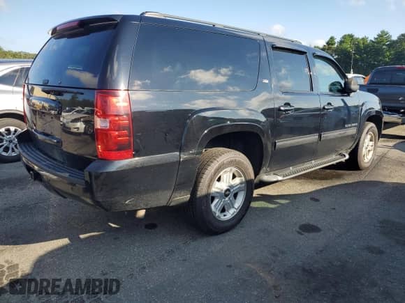 2014 Chevrolet Suburban LT with VIN 1GNSKJE71ER210650, listed as a Copart auction lot 71705935 with 207,810 mi miles and Salvage title. Bid and sale history available at DreamBid. Image 3.