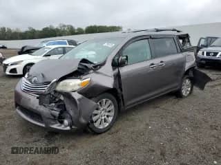2012 Toyota Sienna XLE AAS with VIN 5TDYK3DC4CS261166, listed as a Copart auction lot 71992525 with 157,469 mi miles and Salvage title. Bid and sale history available at DreamBid. Image 1.