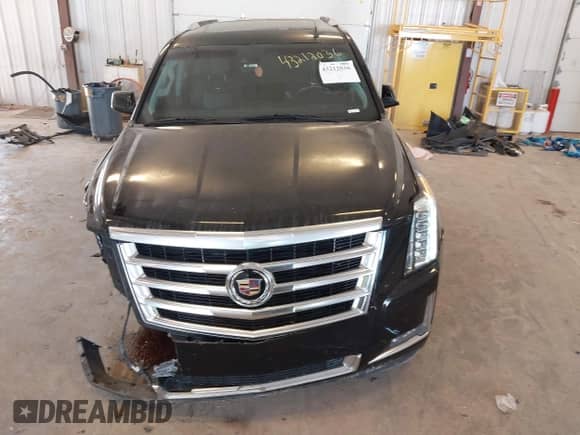2015 Cadillac Escalade Luxury z VIN 1GYS4BKJXFR170797, wystawiony jako IAAI lot #43212036 z przebiegiem 211 481 mil mil oraz . Historia ofert i sprzedaży dostępna na DreamBid. Obrazek 12.