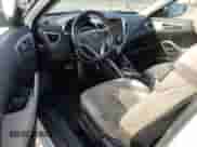 2012 Hyundai Veloster w/Gray Int z VIN KMHTC6AD0CU056764, wystawiony jako Copart lot #84646725 z przebiegiem 157 456 mil mil oraz Czysty tytuł • Clean title. Historia ofert i sprzedaży dostępna na DreamBid. Obrazek 8.