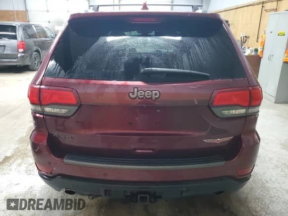 2017 Jeep Grand Cherokee Trailhawk z VIN 1C4RJFLG1HC742210, wystawiony jako Copart lot #68362925 z przebiegiem 130 849 mil mil oraz Czysty tytuł • Clean title. Historia ofert i sprzedaży dostępna na DreamBid. Obrazek 6.